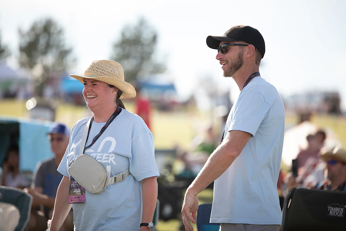 Two volunteers smiling during the Horizon 2026 festival